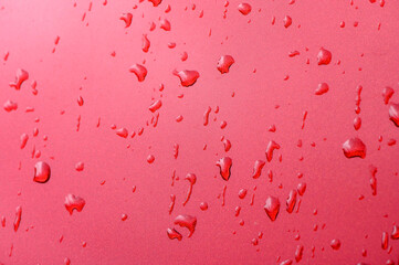 Background - raindrops on the metal surface of a modern car 5