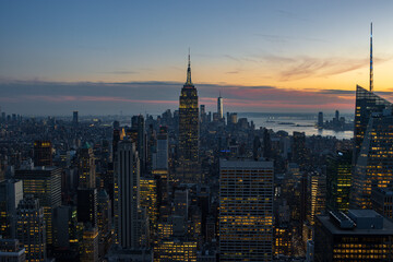 Fototapeta na wymiar Sunset view of New York City skyline from a rooftop (Usa)