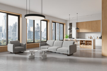 Modern studio interior with chill and dining space, panoramic window