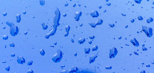 Background - raindrops on the metal surface of a modern car 4