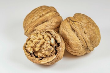 Close-up shot of ripe and shelled walnuts