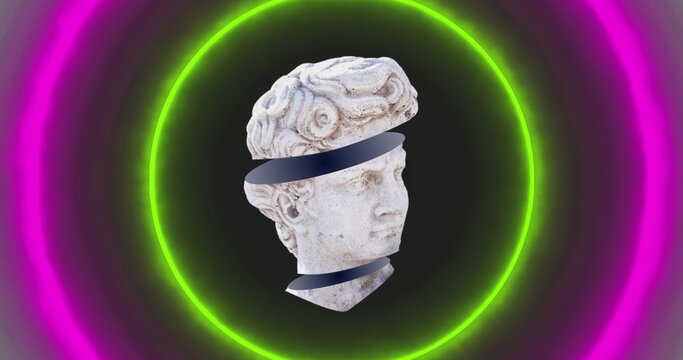 Image of antique sliced head sculpture over neon circles on black background