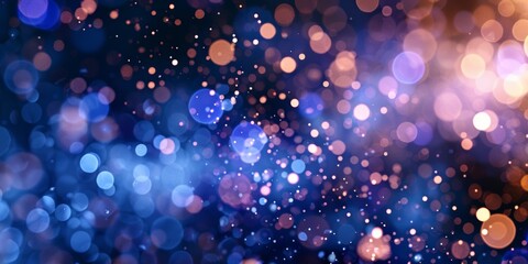 Sparkling blue and purple bokeh lights create a magical and festive abstract background.