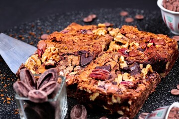 Closeup of brownies with nuts.