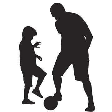 Silhouette of father with son playing football