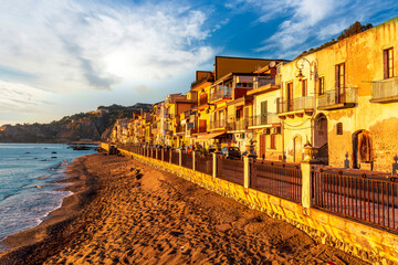 morning sunrise landscape on a city emnarkment with beach and sea coast and beautiful mediterranean...