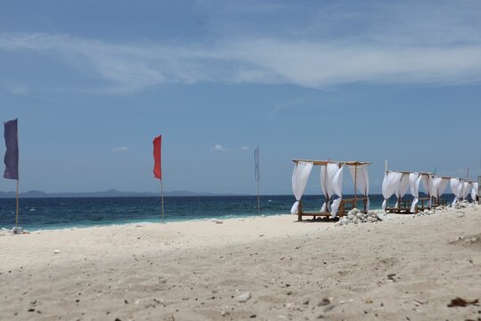 Natural view of the long white beach in Fortune Island, Nasugbu, Batangas, Philippines