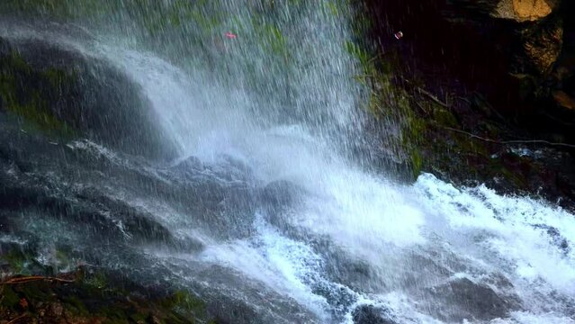 Giessbach Waterfall in a Sunny Summer Day in Giessbach, Brienz, Bernese Oberland, Bern Canton, Switzerland. Slow Motion)