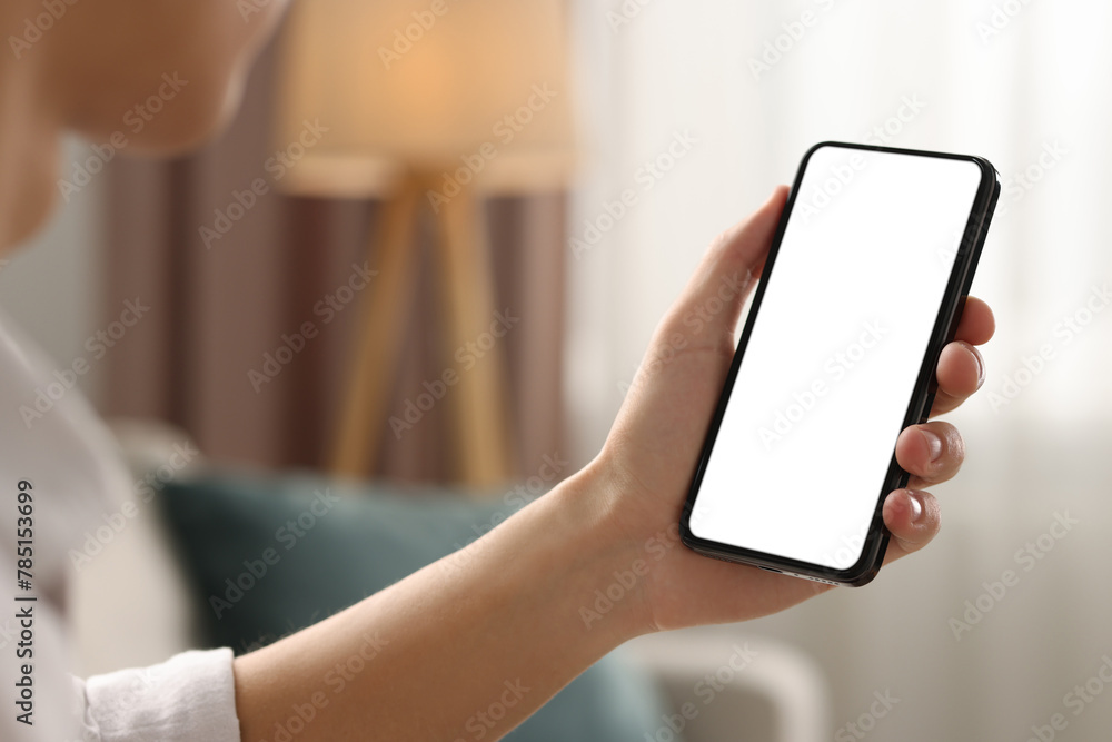 Poster man using smartphone with blank screen indoors, closeup. mockup for design