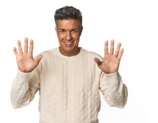 Middle-aged Latino man showing number ten with hands.