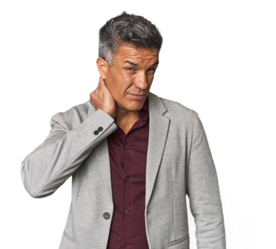 Middle-aged Latino man touching back of head, thinking and making a choice.