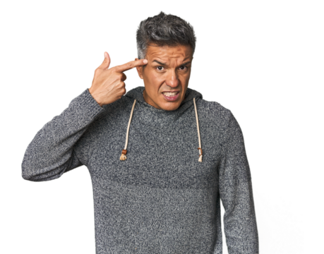 Middle-aged Latino man showing a disappointment gesture with forefinger.