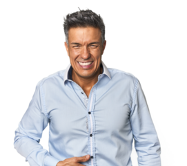 Middle-aged Latino man touches tummy, smiles gently, eating and satisfaction concept.