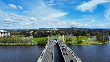 View of Commonwealth avenue and bridge over Burley Griffin lake in Canberra, Australia