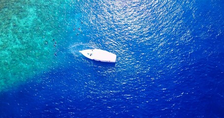 Aerial view of boat in the open sea