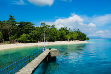 white beaches and tropical sea with blue sky in Maluku, Indonesia