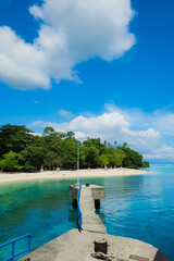 white beaches and tropical sea with blue sky in Maluku, Indonesia