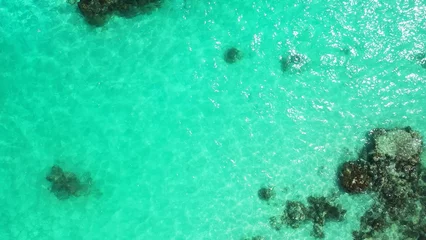 Fototapeten Tranquil turquois water in the beautiful Maldives © Wirestock