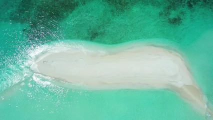 Tafelkleed Aerial drone shot of a deserted tiny tropical island in the Maldives washed by the Indian Ocean © Wirestock