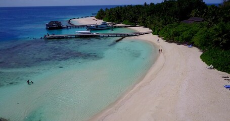 Beautiful shot of a tropical island of an azure ocean
