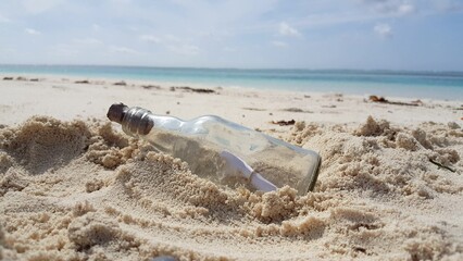 Massage in a bottle at a sandy beach in Asia