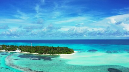 Beautiful view of a sea with an island on a sunny day