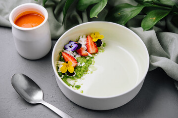Healthy breakfast bowl with edible flowers