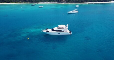 Beautiful view of a boat in a calm blue sea on a sunny day
