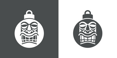Navidad en Hawái. Logo con silueta de bola de navidad con  máscara tiki para tarjetas y felicitaciones - 785179846