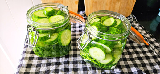 Canning cucumbers, homemade preparations. Pickling cucumbers in glass jars. Delicious and beautiful homemade food