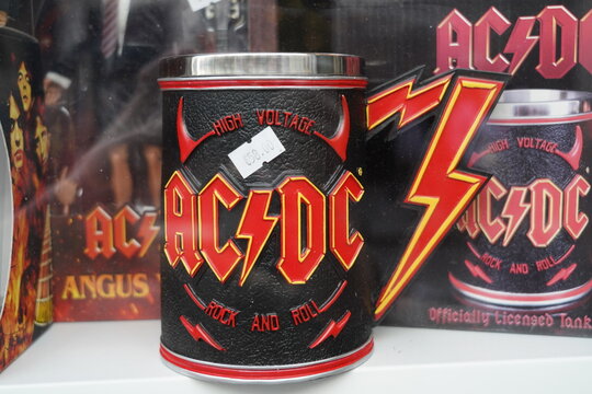 paris france  04 04 2024 : famous heavy metal and hard rock band collectibles in vitrine, ACDC