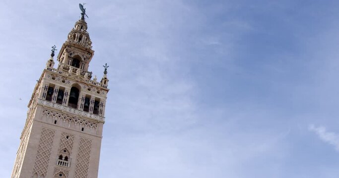 The Giralda bell tower of Seville Cathedral in Seville, 16th-century belfry at the top of the Giralda tower, Spain
