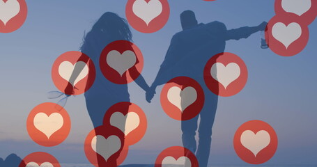 Image of red heart icons floating over couple in love holding hands running - obrazy, fototapety, plakaty