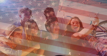 Image of flag of united states of america over friends having fun