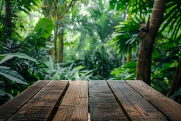 A wooden table with a view of a lush jungle