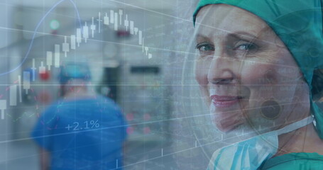 Image of data processing over caucasian female doctor smiling