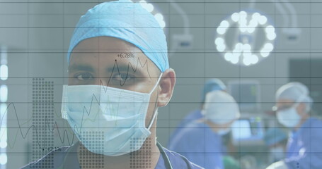 Image of data processing over biracial male doctor with face mask