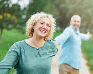woman man couple happy together mature active bonding love outdoor run running walking park fun smiling park old nature wife happiness senior lifestyle people retirement mid middle aged adult vitality