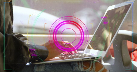 Image of scope scanning and shapes over caucasian woman using laptop in bus