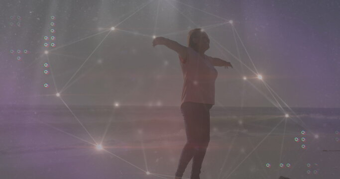 Image of network of connections over african american woman at beach