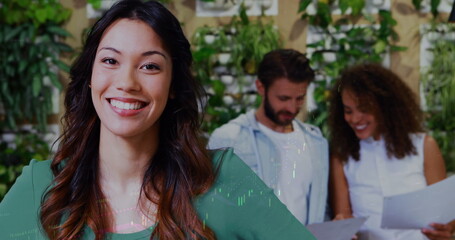 Image of financial data processing over diverse business people at office