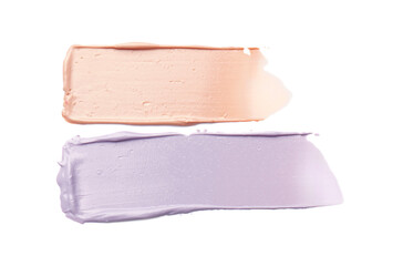 Strokes of pink and purple color correcting concealers isolated on white, top view