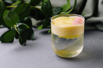 Refreshing citrus smoothie on modern kitchen counter