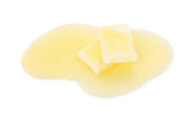 Pieces of melting butter isolated on white