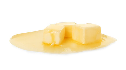 Pieces of melting butter isolated on white