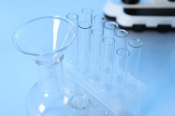 Laboratory analysis. Different glassware on white table, closeup
