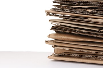 Stack of cardboard pieces isolated on white