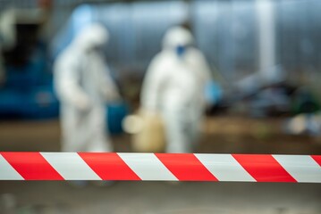 Man inspector scientist investigate chemical gas leak spill with safety face mask PPE suit in area...