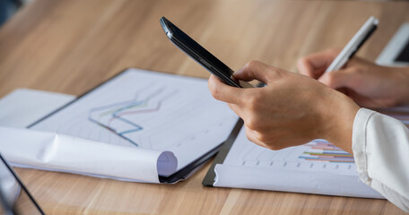 Many data analyst statistics drawing graph analytics diagram work paper for explaining Business feasibility, profit, Estimate sales