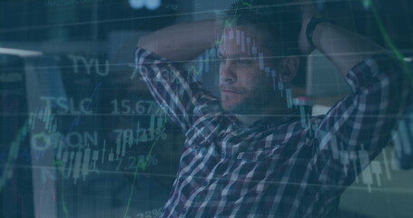 Image of financial data processing over caucasian businessman using computer